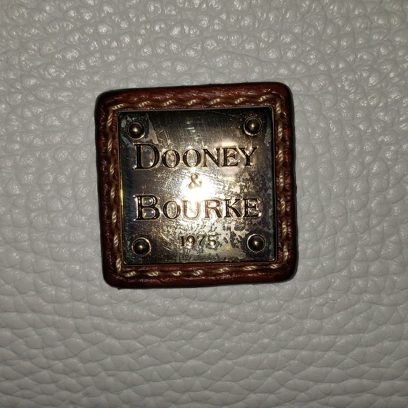 Dooney and Bourke creme/bone colored purse